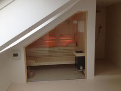 an indoor sauna in the corner of a room