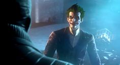 the joker in batman ark is talking to another person with his hand on his hip