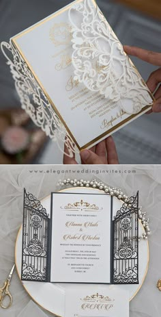 the wedding card is being held up by someone's hand, and there are two pictures