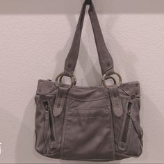 Gray Leather Was Never Used But No Tags. Super Soft Leather. There Are A Few Tiny Black Dots As Showed In The Picture. Not Sure Where They Came From. Otherwise Great Conditions. 15.5” Width 11” Length 5” Depth 9” Strap Drop Casual Shoulder Bag With Metal Hardware And Double Handle, Casual Shoulder Bag With Double Handle And Metal Hardware, Everyday Handheld Shoulder Bag With Silver-tone Hardware, Everyday Use Handheld Shoulder Bag With Silver-tone Hardware, Casual Tote Shoulder Bag With Metal Hardware, Everyday Shoulder Bag With Silver-tone Hardware, Gray Top Handle Bag With Handle Drop, Everyday Handheld Satchel With Silver-tone Hardware, Everyday Use Handheld Satchel With Silver-tone Hardware