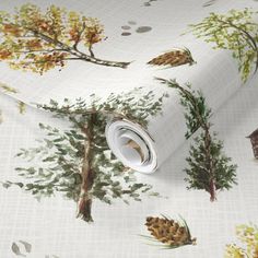 a white wallpaper with trees and pine cones on it