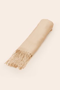 a beige scarf on a white background