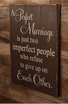 a sign that says perfect marriage is just two imperfect people who refuse to give up on each other