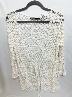 Women's Origami Jacket Cover Up  Open Crochet Weave  Tie Front  Long sleeve    32" L  Size Large New with Tag Casual Crochet Lace Cardigan For Beach, Summer Beach Cardigan With Crochet Trim, Spring Beach Cardigan With Crochet Lace, White Crochet Lace Cardigan For Summer, White Crochet Cardigan For Vacation, White Crochet Cardigan For Summer, White Cardigan For Beach Season, Summer Long Sleeve Cardigan With Crochet Trim, Summer Vacation Cardigan With Crochet Details