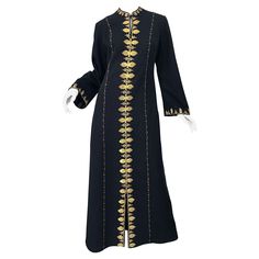 Amazing 1970s black crepe Moroccan long sleeve kaftan maxi dress! Features meticulously embrodiered gold metal throughout. Chic bell /angel sleeved have just the right amount of flare. Hook-and-eye closure at top neck creates a keyhole affect, or can be left open. Full metal zipper up the back with hook-and-eye closure. Very well made, mostly by hand. Can easily be dressed up or down. In great condition. Made in Morocco Approximately Size Medium Measurements: 38 inch bust 30-34 inch waist 40-44 70s Caftan, Clergy Women, Kaftan Maxi Dress, Muslim Women Fashion, Designer Evening Dresses, Modest Fashion Outfits, Muslim Women, Black Silk, Modest Fashion