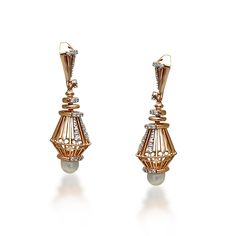 These 18k rose gold hanging earrings, weighing 7.1 grams, feature a chic design adorned with 0.34 carats of round brilliant cut diamonds. The diamonds, with a G-H color and VS-SI clarity, add a touch of sparkle and elegance. The earrings also feature cultured pearl spheres, adding a sophisticated charm. Measuring 1.3 inches in length, these hanging earrings are perfect for any special occasion. The screw back posts ensure a secure and comfortable fit. Ideal for those who appreciate luxurious and Rose Gold Diamond Earrings For Evening, Rose Gold Fine Jewelry Diamond Earrings For Evening, Luxury Rose Gold Linear Earrings For Formal Occasions, Luxury Rose Gold Linear Earrings For Formal Events, Rose Gold Pierced Earrings For Evening, Elegant Rose Gold Diamond Bridal Earrings, Formal Rose Gold Diamond Earrings, Rose Gold Diamond Bridal Earrings For Pierced Ears, Formal Rose Gold Diamond Bridal Earrings