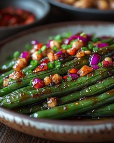 asparagus and other vegetables are served on a plate