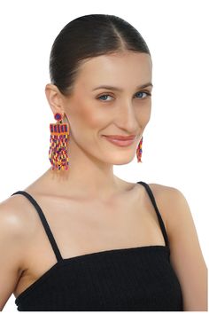 Beaded handmade earrings with Fringes Top attachment Jumpring with Back Pin Handcrafted in multi colour beads Get ready to shine with our enchanting Shakira Multi Color Beaded Earrings, a testament to exquisite craftsmanship and personal style. Each pair is meticulously handcrafted, weaving together a kaleidoscope of vibrant beads in mesmerizing shades of orange and blue. The delicate fringe sways with grace, adding a touch of sophistication and charm to any look.Designed for your comfort and co Leopard Bag, Beaded Earring, Fringe Top, Eye Bags, Shades Of Orange, Shakira, Bag Dress, Small Accessories, To Shine