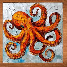 an orange and brown octopus is on a piece of glass mosaic art that looks like it's made out of tiles