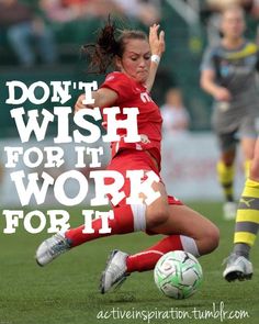 a woman kicking a soccer ball on top of a field with the words don't wish for it work for it