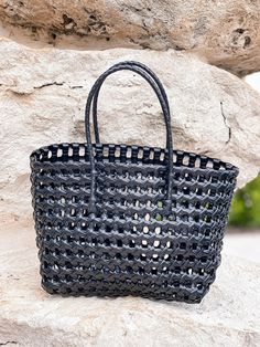 Wear to your next sunny-day event with this cute basket tote! Top Handle to Bottom - 14"H x 12"L Trendy Basket Shoulder Bag For Shopping, Large Capacity Black Basket Shoulder Bag, Shopping Beach Bag With Braided Top Handles, Shopping Beach Bag With Top Handle And Braided Handles, Top Handle Beach Bag With Braided Handles For Shopping, Trendy Basket Shoulder Bag With Braided Handles, Large Capacity Basket Bucket Bag For Shopping, Bucket Beach Bag With Top Carry Handle, Summer Basket Shoulder Bag With Top Handle