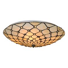 a ceiling light that is on top of a white wall with a brown and black pattern