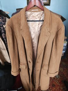 "Extremely RARE Late 1940 -1950s Mid-Century Stroock 100% VICUNA Coat New York, NY Pre-Onwed One Family Estate Provenance. Rare Mid-Century Stroock 100% Vicuna coat purchased in New York City c. Mid-Century. A one family estate. , Stroock 100% Vicuna label, shawl collar, cuffed sleeves, visible stitching at the seams and hemlines, fully lined in luxurious satin silk. The Vicuna is a wild South American camelid related to the Llama. Sleeves from shoulder to end of sleeve Hem 25.5\"  From middle of back of neck down to end of cost 47\"  Armpit to armpit 21.5\"-22\"  Amazing condition for its age. Very few moth bites.  Gorgeous piece. Amazing Amazing coat. Super heavy and warm for the winter.  Any questions feel free to reach out." Vintage Outerwear With Lapel Collar, Vintage Solid Single Breasted Outerwear, Vintage Solid Color Single Breasted Outerwear, Vintage Single-breasted Solid Outerwear, Classic Fitted Vintage Brown Outerwear, Vintage Solid Color Single-breasted Outerwear, Vintage Wool Single-breasted Outerwear, Fitted Vintage Outerwear, Vintage Single-breasted Outerwear In Vintage Brown