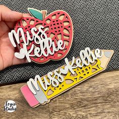 two wooden magnets with the words miss and mr on them