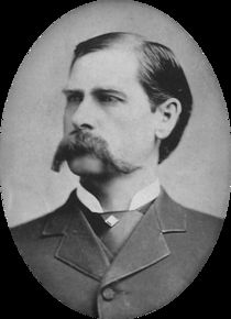 an old black and white photo of a man with a mustache