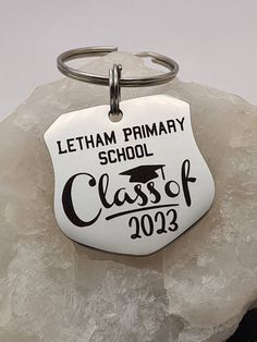 a keychain with the words, letham primary school class of 2012 on it