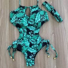 Brand Name:MelphieerMaterial:PolyesterMaterial:SpandexGender:WOMENPattern Type:PrintItem Type:One PiecesSport Type:SwimFit:Fits smaller than usual. Please check this store's sizing infoYear:2020 New Arrivals SwimwearPlace:Street Beach wear,OOTD,Vacation,etcSuitable:Bathing suit women girls ladies femaleItem:Maillot de bain femmeDecoration:Swimming suit for womenStyle:Ladies swimwear & beachwearSwimwear,swimsuit:Bodysuit,bodycon,romperbathing suit,outfits:dressCut out hollow swimsuit:String h Green Floral Print Bodysuit For Beach, Tropical Green One-piece Swimsuit, Green Leaf Print Swimwear For Vacation, Green Tropical Swimwear With Leaf Print, Green Leaf Print Beachwear Swimwear, Ootd Vacation, Backless Swimsuit, Girls Beach, Green Leaf Print