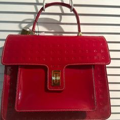 Nwt Arcadia Italian Stamped Patent Leather Red Handbag/Crossbody With Turnlock Closure. Large Pocket Outside And Inside Zipper Pocket With Slip Pockets. Beautiful Goldtone Hardware. Dimension: W 11.25”X H 11”X D 5”. Crossbody Strap Drops 24”. Red Handbag, Crossbody Strap, Cross Body Handbags, Patent Leather, Zipper Pocket, Bag Lady, Stamp, Zipper, Handbags