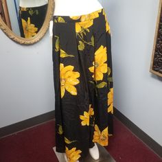 Vintage Black Ankle-Length Skirt With Large Yellow Flowers By Maren & Maren. Tagged Size Large. New With Tags. See Photos For Details. Please Comment Below With Any Questions. *Many Of Our Items Come From Estate Sales Or Other Sources, Which Means We Do Not Know Their History. We Do Not Automatically Launder Or Clean Items That Are Vintage Because We Do Not Want To Damage Them. We Also Do Not Launder Or Clean Items That Are "New With Tags" Or "New In Package", As We Do Not Want To Damage The Tag Yellow High-waist Skirt For Spring, Yellow Pleated Flowy Skirt, High Waist Yellow Skirt For Spring, Yellow Long Skirt For Vacation, Spring Stretch Yellow Maxi Skirt, Yellow Stretch Maxi Skirt For Spring, Yellow Skirt For Day Out, Yellow Fitted Maxi Skirt For Day Out, Yellow Wide Leg Maxi Skirt For Spring