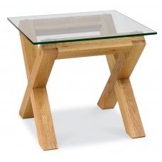 a glass table with wooden legs on a white background