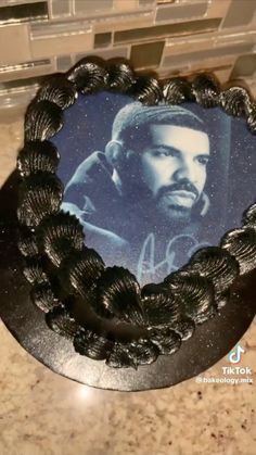 a cake with a picture of a man on it