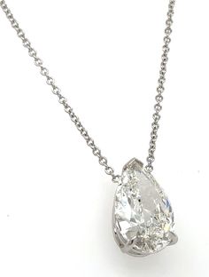 Adorn yourself with refinement and rarity wearing this GIA Certified 3.68Carat Diamond Pear-shape Solitaire Pendant Necklace. Expertly cut and polished to emit an illuminating sparkle, this luxurious necklace is a symbol of prestige. Let its exquisite beauty catalyze your ensemble with timeless sophistication. Metal: 14K White GoldDiamond Shape: Pear-cut Approx. Dimensions: 9mm X 15mmDiamond Weight: 3.68carat Natural earth-minedCertificate: GIA certificate # 5221618021Chain Length: 17''- 18' Luxurious Necklace, Gia Certificate, Solitaire Pendant Necklace, Pear Cut Diamond, Solitaire Pendant, Natural Earth, Pear Cut, Rarity, Pear Shape