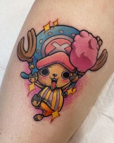 a cartoon character tattoo on the leg of a woman's thigh, with an ice cream cone in her hand