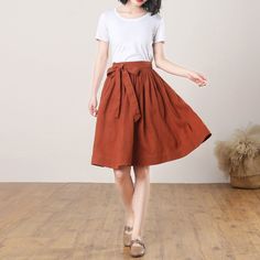 "This Pleated midi skirt is perfect for this summer, Crafted with 100% linen,  featuring elasitc high waist and deep pocket, comfy and versatile ★★FEATURES 100% Linen Back elastic waist Two side pockets Pleated skirt Regular fit A Line skirt No lining Perfect for Summer, Spring, Autumn ★★ Model Size Height approx 162 cm (5′ 4″)  Bust 84 cm (33\")  Waist 66 cm (26\")  She wears size XS. ★★ Bespoke Order Service If you Request other color Request the length Your height is not between 155 cm- 172 c Casual A-line Pleated Skirt For Summer, Casual A-line Pleated Summer Skirt, Cotton A-line Summer Skirt, A-line Cotton Bottoms For Summer, Casual Linen Maxi Skirt, Summer A-line Pleated Skirt In Solid Color, Summer Linen Midi-length Bottoms, Solid Linen Skirt For Summer, Solid Color Linen Flared Skirt