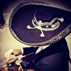 This picture reminds me of my father!!! We burried him wearing his black mariachi suit n i kept the hat . Oh how i miss him. Mariachi Suit, Mexican History, Ballet Folklorico, Fav Music, Miss Him, Pet Signs, I Miss Him, Mexican Folk Art