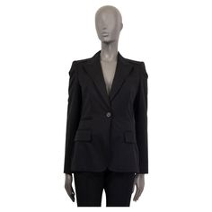 100% authentic Gucci classic blazer in black cotton (assumed cause tag is missing). Features padded shoulders, two flap pockets, one slit pocket and a notch collar. Opens with One button on the front. Lined in black silk (assumed cause tag is missing). Has been worn and is in excellent condition. Measurements Tag Size 42 Size M Shoulder Width 38cm (14.8in) Bust 86cm (33.5in) to 100cm (39in) Waist 70cm (27.3in) to 78cm (30.4in) Hips 94cm (36.7in) to 110cm (42.9in) Length 67cm (26.1in) Sleeve Leng Classic Blazer, Notch Collar, Gucci Black, Black Silk, Flap Pocket, Black Cotton, Blazer Jacket, Suit Jacket, Sleeve Length