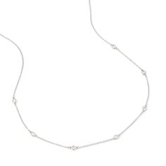 Add an understated touch of luxury to any outfit, whether it be for business or pleasure, with our Celeste 18ct White Gold Diamond Necklace. The timeless and classic design features seven brilliant-cut diamonds equally spaced along an 18 carat white gold chain. The rolo-style chain is adjustable, and can be adjusted to measure either 40cm or 42cm, with a hallmark to the clasp to ensure authenticity. This charming piece would make the perfect gift on a special birthday, anniversary, graduation or wedding day, sure to be treasured for years to come. Special Birthday, Brilliant Cut Diamond, Birthday Anniversary, White Gold Diamonds, Gold Chain, Hallmark, Design Features, Gold Diamond