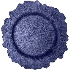 a blue plate with an intricate design on the rim and bottom, sitting in front of a white background