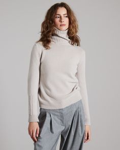 DESCRIPTIONThis turtleneck women's sweater is crafted from plain knitted kid cashmere, an extremely fine and soft fibre, obtained exclusively from the undercoat of Hircus goat kids. The mock turtleneck features a dense micro-ribbed pattern. Its precious and exclusive yarn makes this garment the luxury version of an essential knitwear item.FABRICSThe "kid cashmere" yarn is obtained from the undercoat of Hircus goats kids. The natural molt allows to harvest this precious, exclusive and ultralight Goat Kidding, Cashmere Yarn, Cashmere Turtleneck, Mock Turtleneck, Women's Wardrobe, Turtleneck Sweater, Capri, Knitwear, Cashmere