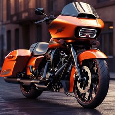 an orange motorcycle parked in front of a building