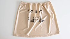 a skirt with the words sew a half - slip written in black on it