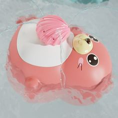 a pink and white pig floating in water