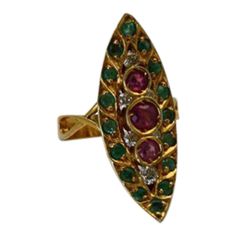 This is part of Chairish’s Fine Jewelry assortment.  SIZE: 6 1/2″ METAL: 18k yellow gold MAIN STONES: 3 center rubies, .30 ct; 2 additional, .16 ct each; total rubies .62 ct, color purplish red STONES: Diamonds, .30 ct, clarity SI1, color G-H STONES: 16 emeralds, .42 ct, color light bluish green WEIGHT: 8 grams CONDITION: Vintage Deco, Excellent  The Art Deco pagoda Emerald and Ruby ring was all the rage during the early 1930's. The 1930's brought back a fascination with all things Asian. The 19 Antique Yellow Gold Multi-stone Ruby Ring, Antique Multi-stone Ruby Ring In Yellow Gold, Oval Multi-stone Ruby Ring In Yellow Gold, Red Stones, Ruby Emerald, Bluish Green, Red Stone, Ruby Ring, Emerald Diamond