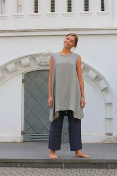 "Handcrafted Oeko-Tex Standard certified 100% European linen smock dress ideal for everyday wear. Perfect for springtime or chilly summer days. Always dress to kill! Neckline: round Sleeves: no Pockets: no Details: *Colour shown: small grey stripes *Model is wearing size M *Medium weight *Maternity-friendly *Relaxed fit *Not-ironed (and no need to) *Handmade by @LinenCloud Easy care: - Machine wash gentle - Wash seperately or with similar colours - Tumble dry on low heat - Non-iron. Simply wash Summer Lagenlook Linen Dress For Daywear, Summer Lagenlook Linen Dress, Spring Linen Lagenlook Dress, Casual Linen Tunic For Spring, Oversized Linen Dress For Spring, Casual Linen Dress With Asymmetrical Hem, Spring Linen Tunic For Loungewear, Casual Linen Summer Tunic, Oversized Linen Tunic Dress For Spring