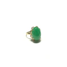 A green jade in oval cabochon shape is featured in an elegant and unique ring with a six-prong setting. Precious Metal: 14 Karat Yellow Gold Gemstone: Oval Cabochon Green Jade Size: 16.00 mm* x 12.00 mm* Height: 17 mm* *All weights and measurements are approximate. Please contact us if you have further questions about alternate sizes or styles, availability, specifications, and personalization options. Jade Green Nails, Jade Engagement Ring, Memory Jewelry, Jewellery Ideas, Popular Jewelry, Jade Ring, Wedding Mood, Unique Ring, Memorial Jewelry