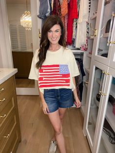 Show off your patriotic side with our Betsy Flag Patch Top! This unique top features a playful American flag patch with rope and embroidery details, making it the perfect option for summer holidays. Betsy Ross would be proud! Top is lightweight looped Terry fabric and is a cream color. Top measures 29" in length. Bust measures 24" from underarm seam to seam. Measurements taken on a small. Fabric has some give. This has a generous, oversized fit. Your normal size will be loose. If in between size Patriotic Beach Tops With Flag Print, Red American Flag Summer Top, Betsey Ross Flag, Patriotic American Flag Print Sleeveless Top, Skirt Extender, Cotton V-neck Top With American Flag Print, Patch Top, American Flag Patch, Betsy Ross