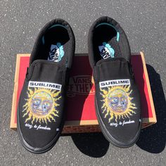 Rock out with these custom Sublime all black slip on vans. We buy each pair of shoes BRAND NEW. Each pair is made to order, please make sure you put in the correct shoe size before you check out. The ink is permanent and will never come off, fade away, or peel off. Made in the USA. This price includes everything: shoes and artwork. Each pair of shoes is made-to-order and takes 2-3 weeks to ship usually. Because the artwork is custom-made for you, there are no exchanges or returns. Please know yo Custom Slip-on Sneakers For Skateboarding, Custom Slip-on Skateboarding Sneakers With Rubber Sole, Black Slip-ons With Vulcanized Sole For Streetwear, Streetwear Slip-ons With Rubber Sole And Round Toe, Summer Streetwear Slip-ons, Black Slip On Vans, Slip On Vans, Black Slip On, Shoes Brand