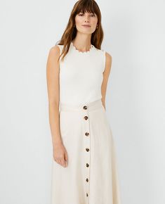 A scalloped neckline gives our shoulder button sweater shell an extra pretty edge. Scallop jewel neck. Sleeveless. Shoulder button placket. Scallop Collar, Work Outfit Inspiration, Shell Top, Flattering Dresses, Collar Sweater