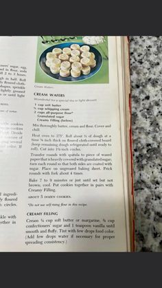 an open recipe book on a table with food items in it and the words cream wafers