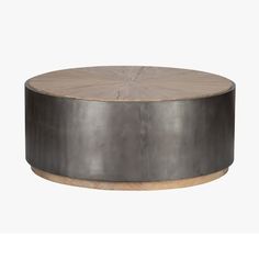 a round metal and wood coffee table