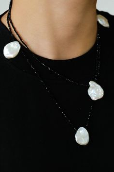 Captivating Baroque Pearl Petals meets sparkling Obsidian in this exquisite necklace. With rare and high-quality pearls, it effortlessly adds a refined yet relaxed vibe to any outfit. Elevate your style today. Gemstone: Black Spinel/Natural Baroque Pearl Necklace Length: 95cm Weight: 41.5g Obsidian Meaning, Black Spinel Necklace, Spinel Necklace, Baroque Pearl Necklace, Gemstone Beaded Necklace, Necklace Sets, Black Spinel, Swarovski Pearls, Single Earring