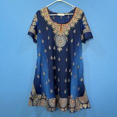 This Is A Really Lovely Blue Dress Form Lapogee. It Is An Indian Brand With A Really Cool Design With Gold Accents. Flutter Sleeves And Ruffle At Hem. Pockets. Size Is Determined By Tag So Please Also See Measurements. Thanks! -Brand Lapogee -Size Women’s Xl -Color Blue -Material 100% Polyester -Made In India Dress Is New However There Are Some Light Spots And Marks That Are From The Manufacturer. I’ve Listed Some Up Close Pictures For Reference. Please Let Me Know If You Have Any Questions Or W Blue Short Sleeve Casual Tunic, Blue Casual Short Sleeve Tunic, Casual Blue Short Sleeve Tunic, Fitted Blue Tunic For Summer, Blue Fitted Tunic For Summer, Blue Fitted Tunic, Fitted Blue Casual Tunic, Fitted Casual Blue Tunic, Casual Fitted Blue Tunic