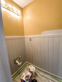 a bathroom that is being remodeled and painted