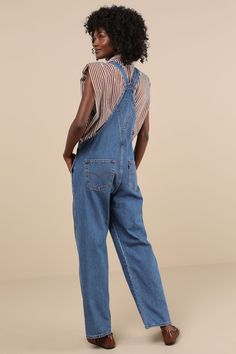 The Levi's Vintage Medium Blue Overalls are a tried and true staple that we know you're going to love! Sturdy denim (in Levi's Foolish Love wash) shapes these classic overalls that have a front bib with a patch pocket (with a logo tag) and adjustable straps that form into a modified racerback. A seamed waist tops relaxed fit straight leg bottoms with two front pockets and two back pockets. Branded button closures at the hips. Red logo tag at back. Fit: This garment fits true to size. Length: Flo Blue Overalls, Logo Tag, Red Logo, Tried And True, Denim Overalls, Vintage Levis, Medium Blue, Patch Pocket, Levi's