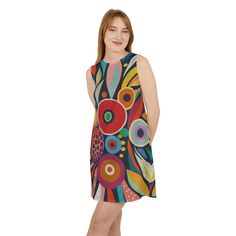 This chic sleeveless dress has a jewel neckline and a flattering shift silhouette, offering timeless style and comfortable wear. Its eye-catching all over print design makes it a beautiful fashion statement suitable for any occasion. Runs true to size with its reliable fit, complemented by a hidden-back, 18'' zip for easy dressing. The zipper features YKK's invisible nylon upholstery design, complete with a non-separating, closed-end construction with an automatic lock slider in white, ensuring a seamless finish. - Material: 95% polyester, 5% spandex - Medium fabric (7.5 oz /yd² (255 g/m - White zipper - Assembled in the USA from globally sourced parts - Seam thread color automatically matched to design (black or white) Multicolor Sleeveless Sundress With Colorful Pattern, Colorful Pattern Fitted Sleeveless Dresses, Fitted Sleeveless Dress With Colorful Pattern, Sleeveless Summer Mini Dress With Colorful Pattern, Casual Sleeveless Mini Dress With Colorful Pattern, Sleeveless Mini Dress With Colorful Pattern For Summer, Multicolor A-line Sundress Sleeveless, Multicolor A-line Sleeveless Sundress, Upholstery Design