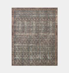 an area rug with various colors and patterns on it, including blue, green, beige and brown